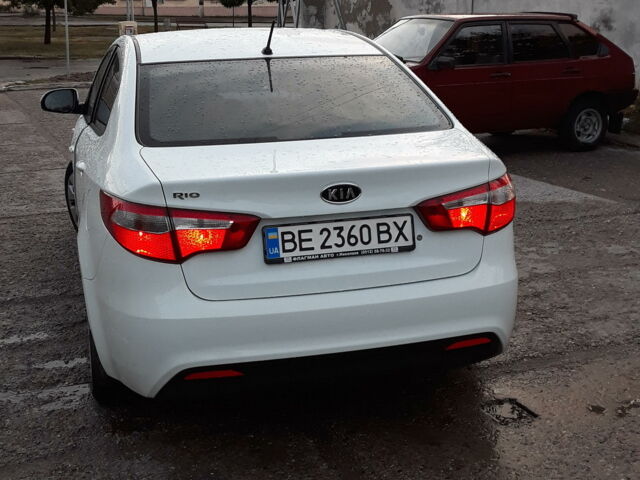 Білий Кіа Ріо, об'ємом двигуна 1.4 л та пробігом 99 тис. км за 9700 $, фото 1 на Automoto.ua