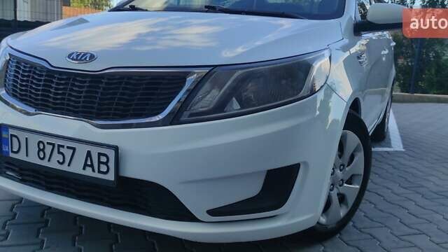 Білий Кіа Ріо, об'ємом двигуна 1.4 л та пробігом 168 тис. км за 6800 $, фото 24 на Automoto.ua