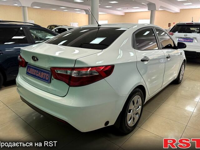 Белый Киа Рио, объемом двигателя 1.4 л и пробегом 167 тыс. км за 7500 $, фото 3 на Automoto.ua