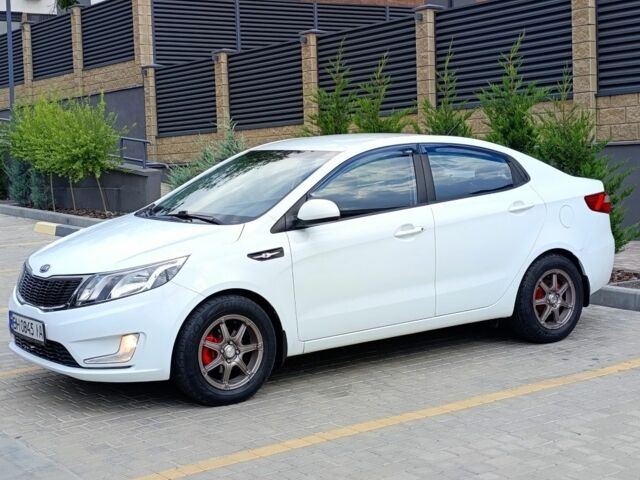 Белый Киа Рио, объемом двигателя 1.4 л и пробегом 99 тыс. км за 6517 $, фото 6 на Automoto.ua