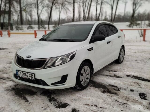 Білий Кіа Ріо, об'ємом двигуна 1.4 л та пробігом 98 тис. км за 8600 $, фото 5 на Automoto.ua