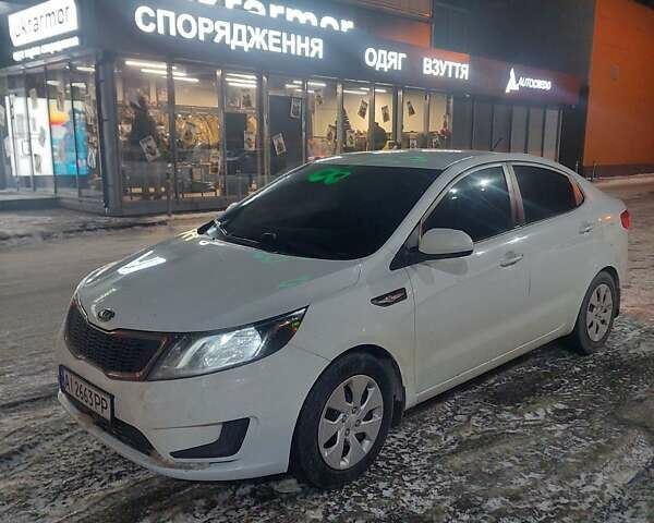 Білий Кіа Ріо, об'ємом двигуна 1.4 л та пробігом 266 тис. км за 6900 $, фото 3 на Automoto.ua