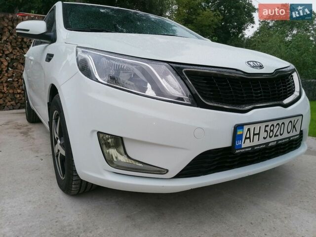 Білий Кіа Ріо, об'ємом двигуна 1.59 л та пробігом 223 тис. км за 6500 $, фото 1 на Automoto.ua