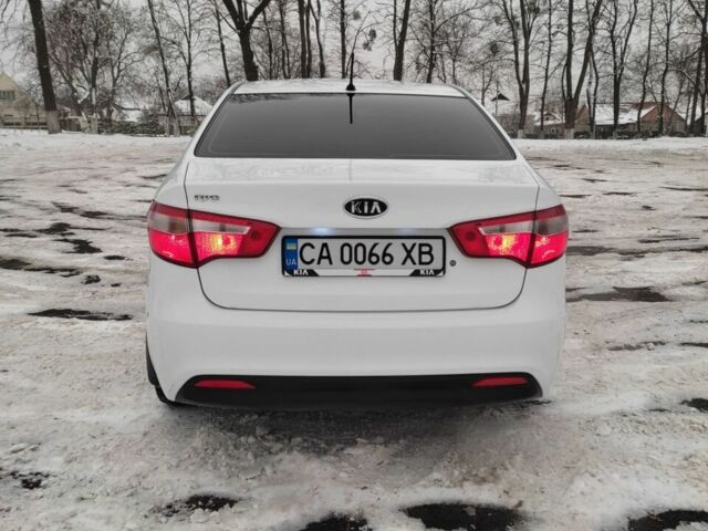 Белый Киа Рио, объемом двигателя 1.4 л и пробегом 98 тыс. км за 8600 $, фото 2 на Automoto.ua