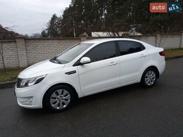 Белый Киа Рио, объемом двигателя 1.6 л и пробегом 42 тыс. км за 7800 $, фото 2 на Automoto.ua