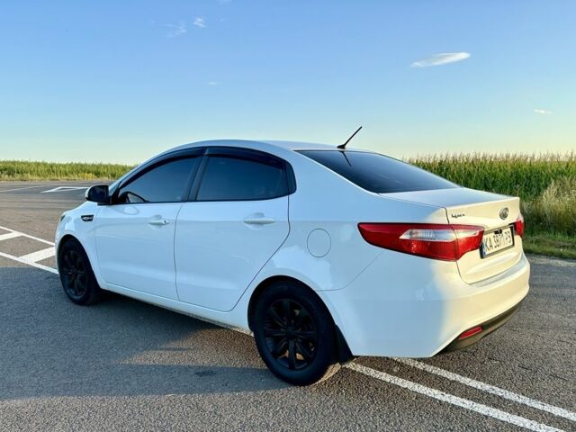 Білий Кіа Ріо, об'ємом двигуна 1.4 л та пробігом 142 тис. км за 6000 $, фото 6 на Automoto.ua