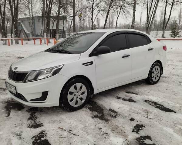 Белый Киа Рио, объемом двигателя 1.4 л и пробегом 98 тыс. км за 8600 $, фото 1 на Automoto.ua