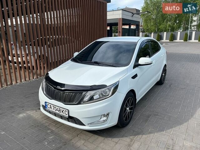 Белый Киа Рио, объемом двигателя 1.6 л и пробегом 174 тыс. км за 7700 $, фото 7 на Automoto.ua