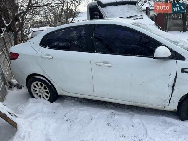 Белый Киа Рио, объемом двигателя 1.4 л и пробегом 175 тыс. км за 2800 $, фото 1 на Automoto.ua