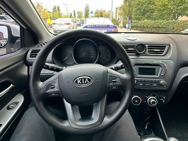 Білий Кіа Ріо, об'ємом двигуна 1.4 л та пробігом 118 тис. км за 6899 $, фото 7 на Automoto.ua