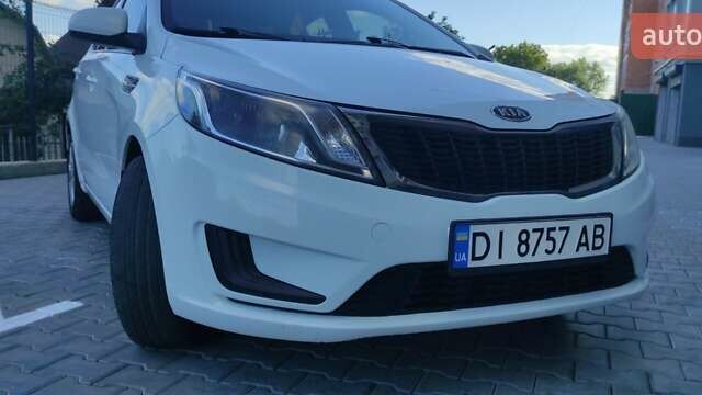 Білий Кіа Ріо, об'ємом двигуна 1.4 л та пробігом 168 тис. км за 7800 $, фото 7 на Automoto.ua
