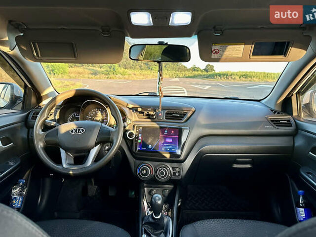 Білий Кіа Ріо, об'ємом двигуна 1.4 л та пробігом 142 тис. км за 6200 $, фото 30 на Automoto.ua