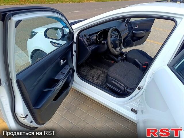 Білий Кіа Ріо, об'ємом двигуна 1.4 л та пробігом 99 тис. км за 6500 $, фото 11 на Automoto.ua