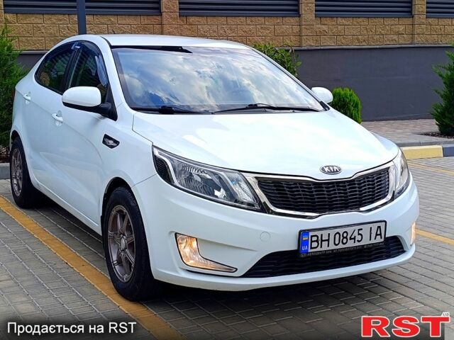 Білий Кіа Ріо, об'ємом двигуна 1.4 л та пробігом 99 тис. км за 6500 $, фото 2 на Automoto.ua