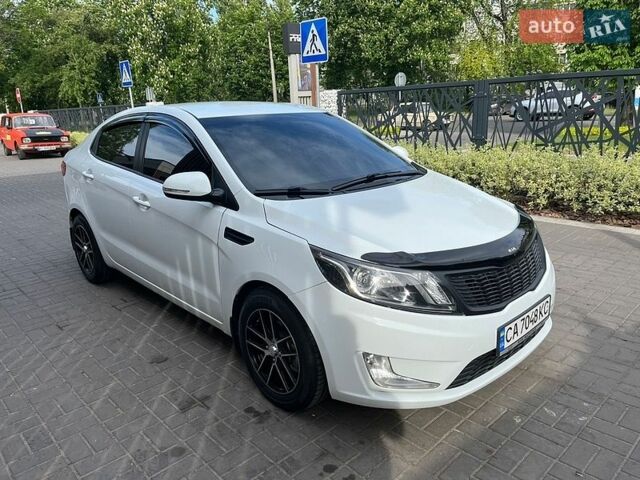 Белый Киа Рио, объемом двигателя 1.6 л и пробегом 174 тыс. км за 7700 $, фото 4 на Automoto.ua
