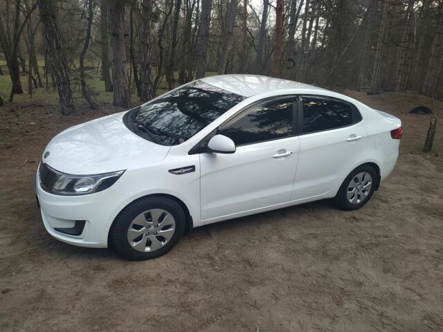 Білий Кіа Ріо, об'ємом двигуна 1.4 л та пробігом 158 тис. км за 6500 $, фото 1 на Automoto.ua
