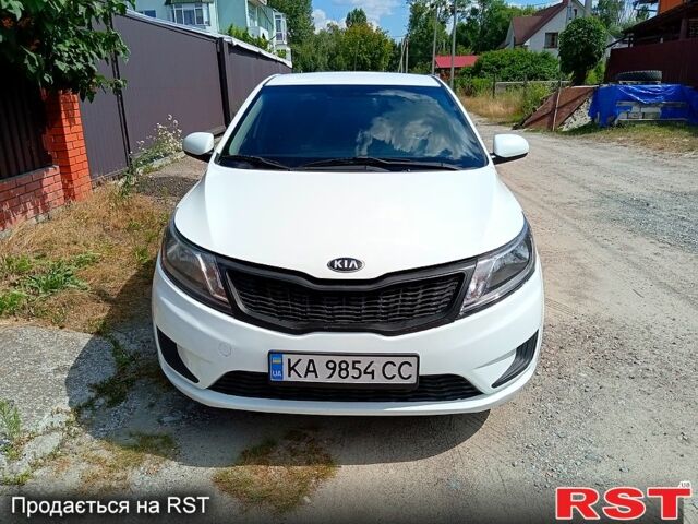 Білий Кіа Ріо, об'ємом двигуна 1.4 л та пробігом 213 тис. км за 7800 $, фото 1 на Automoto.ua