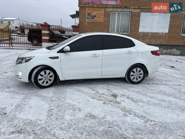 Белый Киа Рио, объемом двигателя 1.6 л и пробегом 148 тыс. км за 7550 $, фото 4 на Automoto.ua