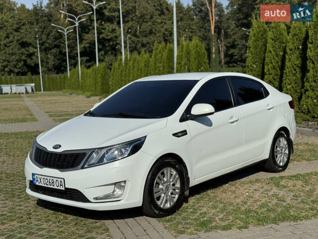 Білий Кіа Ріо, об'ємом двигуна 1.4 л та пробігом 185 тис. км за 6999 $, фото 4 на Automoto.ua
