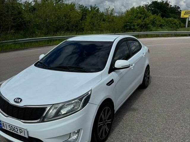 Белый Киа Рио, объемом двигателя 1.59 л и пробегом 241 тыс. км за 6599 $, фото 2 на Automoto.ua