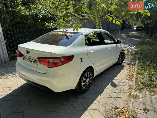 Білий Кіа Ріо, об'ємом двигуна 1.4 л та пробігом 94 тис. км за 7400 $, фото 1 на Automoto.ua