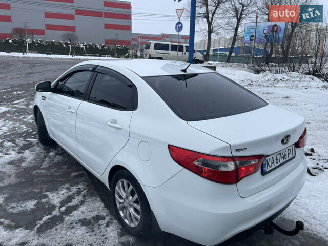 Білий Кіа Ріо, об'ємом двигуна 1.4 л та пробігом 216 тис. км за 7850 $, фото 17 на Automoto.ua