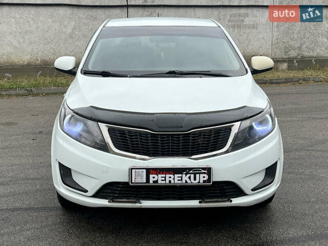 Белый Киа Рио, объемом двигателя 1.4 л и пробегом 246 тыс. км за 6550 $, фото 1 на Automoto.ua