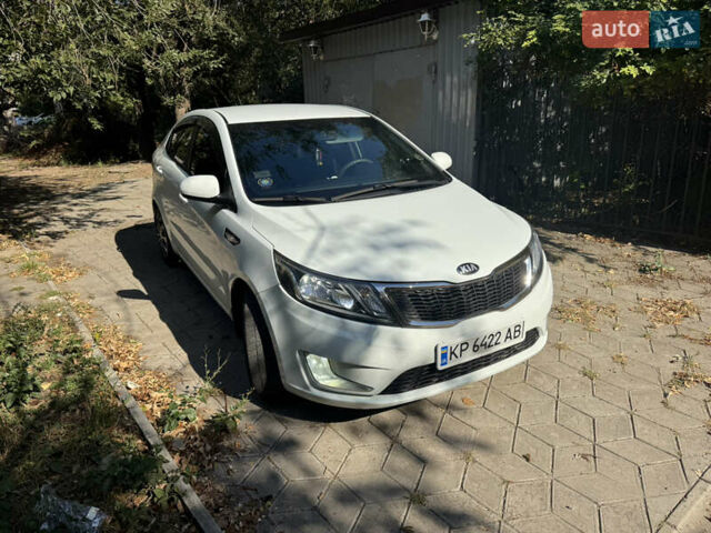 Білий Кіа Ріо, об'ємом двигуна 1.4 л та пробігом 84 тис. км за 9200 $, фото 5 на Automoto.ua