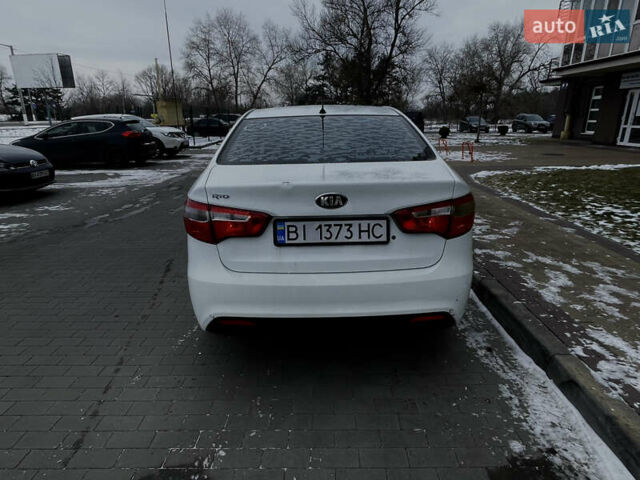 Білий Кіа Ріо, об'ємом двигуна 1.4 л та пробігом 210 тис. км за 6050 $, фото 5 на Automoto.ua