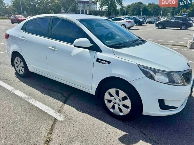Білий Кіа Ріо, об'ємом двигуна 1.4 л та пробігом 179 тис. км за 7600 $, фото 4 на Automoto.ua