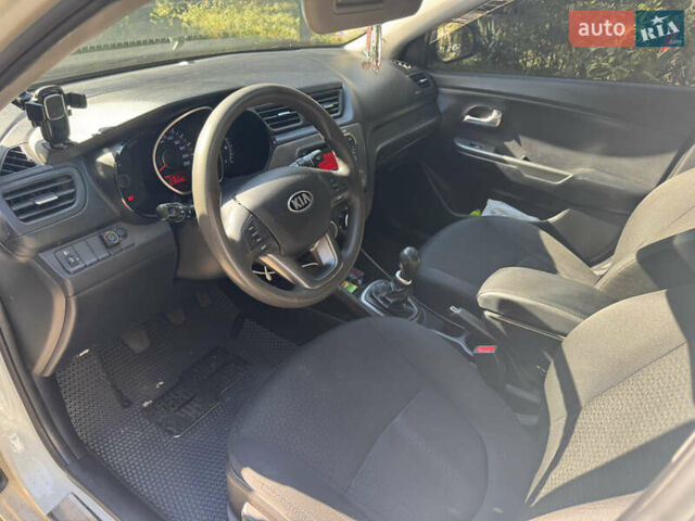 Білий Кіа Ріо, об'ємом двигуна 1.4 л та пробігом 84 тис. км за 9200 $, фото 13 на Automoto.ua