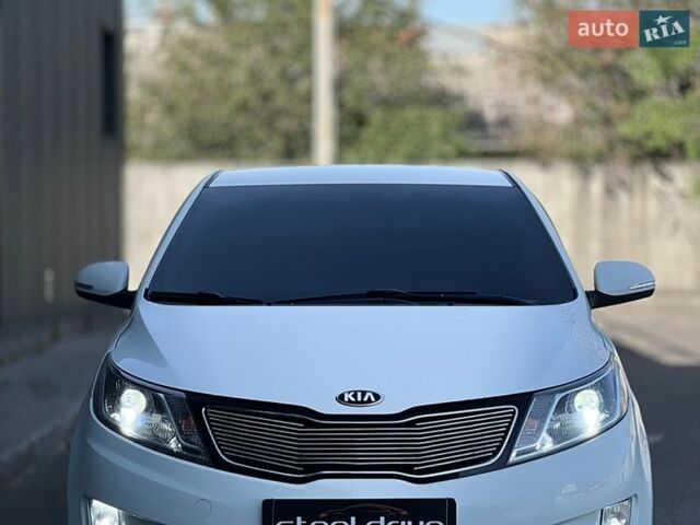 Белый Киа Рио, объемом двигателя 1.6 л и пробегом 135 тыс. км за 9199 $, фото 1 на Automoto.ua