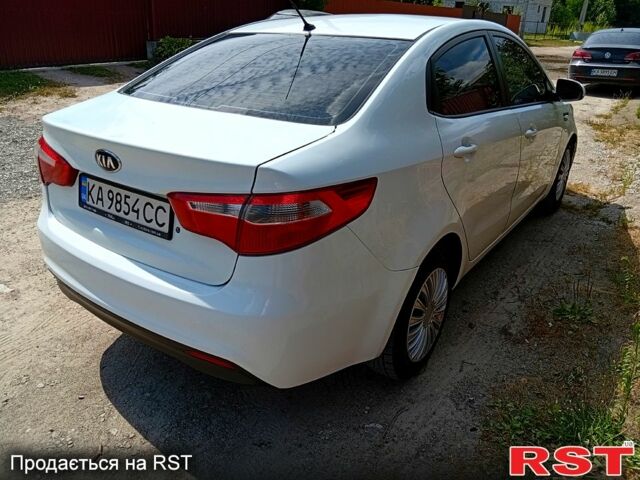 Білий Кіа Ріо, об'ємом двигуна 1.4 л та пробігом 213 тис. км за 7800 $, фото 3 на Automoto.ua