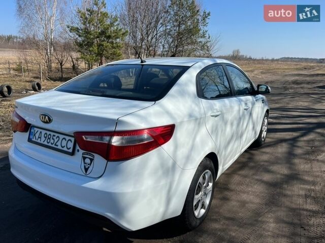 Білий Кіа Ріо, об'ємом двигуна 1.4 л та пробігом 210 тис. км за 5800 $, фото 6 на Automoto.ua