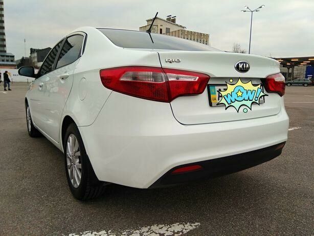 Белый Киа Рио, объемом двигателя 1.4 л и пробегом 83 тыс. км за 10200 $, фото 2 на Automoto.ua