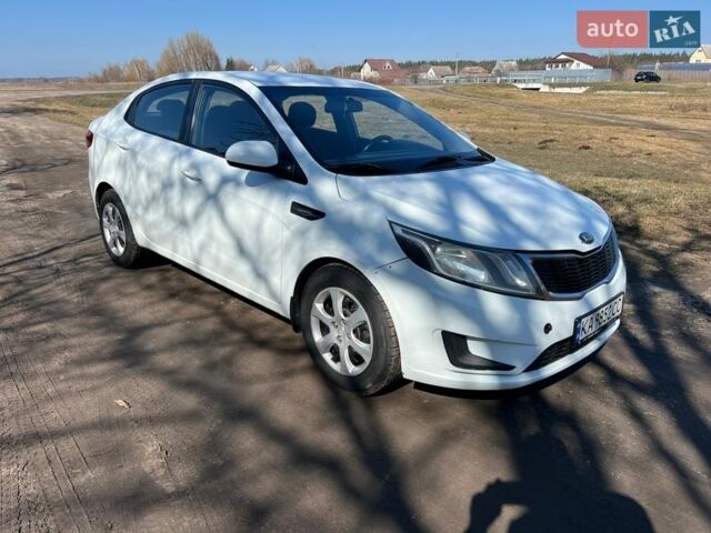 Білий Кіа Ріо, об'ємом двигуна 1.4 л та пробігом 210 тис. км за 5800 $, фото 1 на Automoto.ua