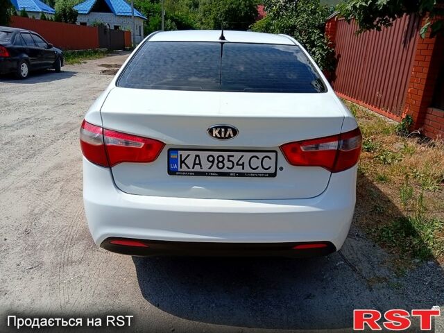 Білий Кіа Ріо, об'ємом двигуна 1.4 л та пробігом 213 тис. км за 7800 $, фото 4 на Automoto.ua
