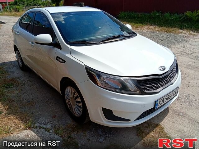 Білий Кіа Ріо, об'ємом двигуна 1.4 л та пробігом 213 тис. км за 7800 $, фото 2 на Automoto.ua