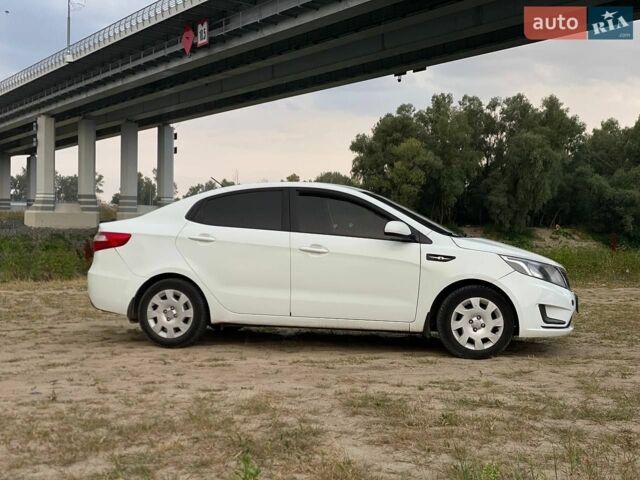 Білий Кіа Ріо, об'ємом двигуна 1.4 л та пробігом 258 тис. км за 6200 $, фото 18 на Automoto.ua