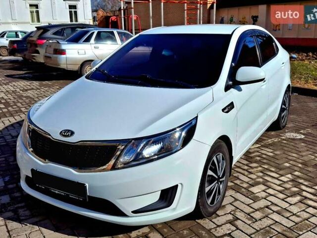 Белый Киа Рио, объемом двигателя 1.4 л и пробегом 87 тыс. км за 8750 $, фото 9 на Automoto.ua