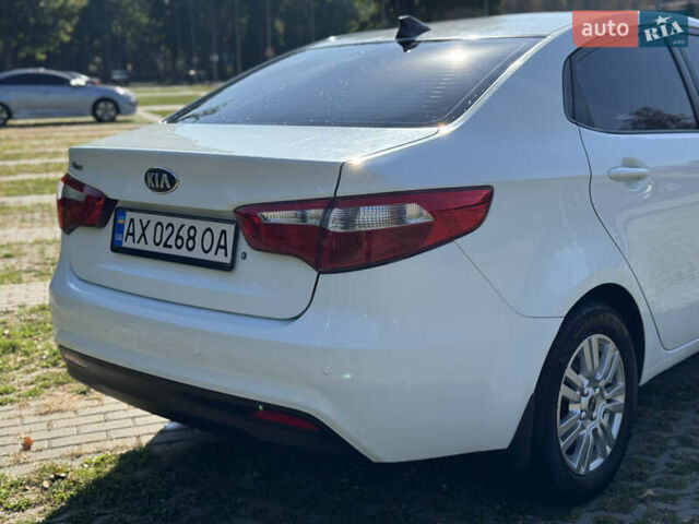 Білий Кіа Ріо, об'ємом двигуна 1.4 л та пробігом 185 тис. км за 6999 $, фото 9 на Automoto.ua