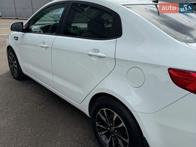 Білий Кіа Ріо, об'ємом двигуна 1.4 л та пробігом 139 тис. км за 8200 $, фото 18 на Automoto.ua