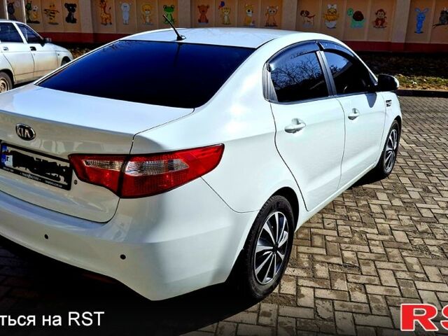 Білий Кіа Ріо, об'ємом двигуна 1.4 л та пробігом 87 тис. км за 8750 $, фото 1 на Automoto.ua