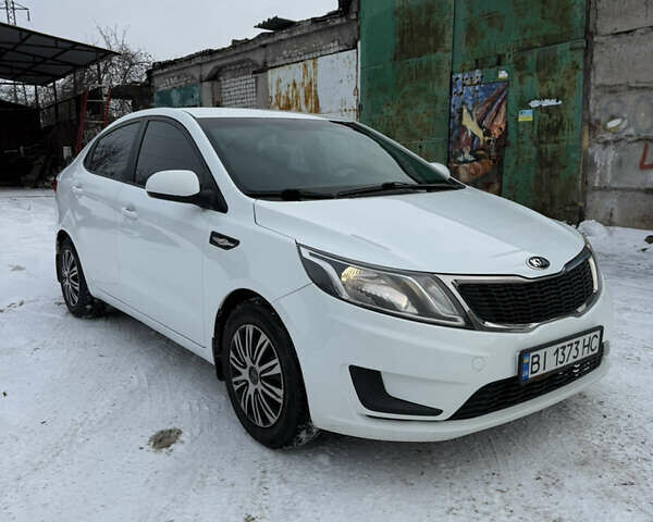 Белый Киа Рио, объемом двигателя 1.4 л и пробегом 211 тыс. км за 6950 $, фото 1 на Automoto.ua