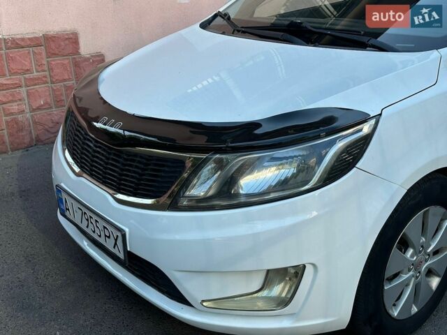 Білий Кіа Ріо, об'ємом двигуна 1.4 л та пробігом 214 тис. км за 6600 $, фото 3 на Automoto.ua