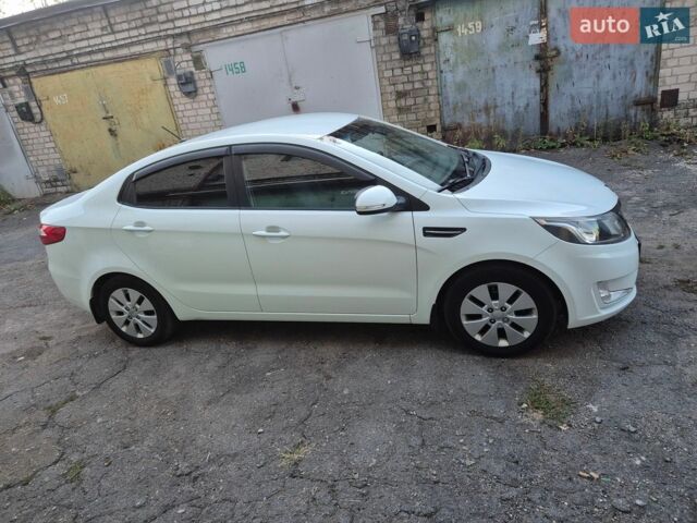 Белый Киа Рио, объемом двигателя 1.6 л и пробегом 156 тыс. км за 8700 $, фото 2 на Automoto.ua