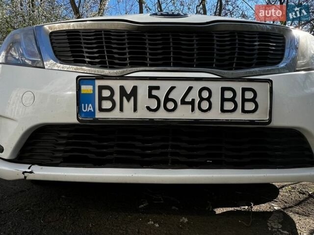 Белый Киа Рио, объемом двигателя 1.4 л и пробегом 176 тыс. км за 7900 $, фото 8 на Automoto.ua