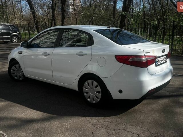 Білий Кіа Ріо, об'ємом двигуна 1.4 л та пробігом 176 тис. км за 6200 $, фото 5 на Automoto.ua