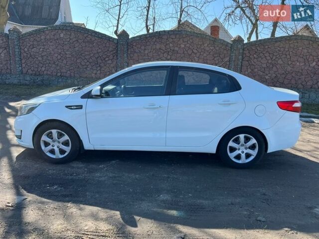 Білий Кіа Ріо, об'ємом двигуна 1.4 л та пробігом 210 тис. км за 5800 $, фото 4 на Automoto.ua