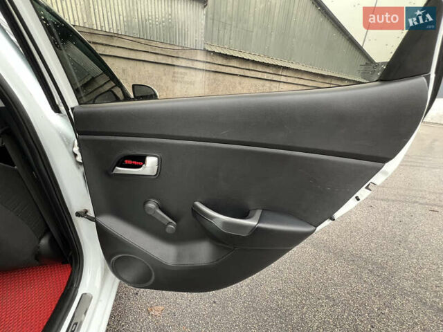 Белый Киа Рио, объемом двигателя 1.4 л и пробегом 246 тыс. км за 6550 $, фото 20 на Automoto.ua